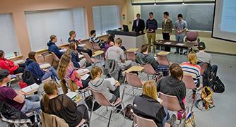 A group of students getting a lecture